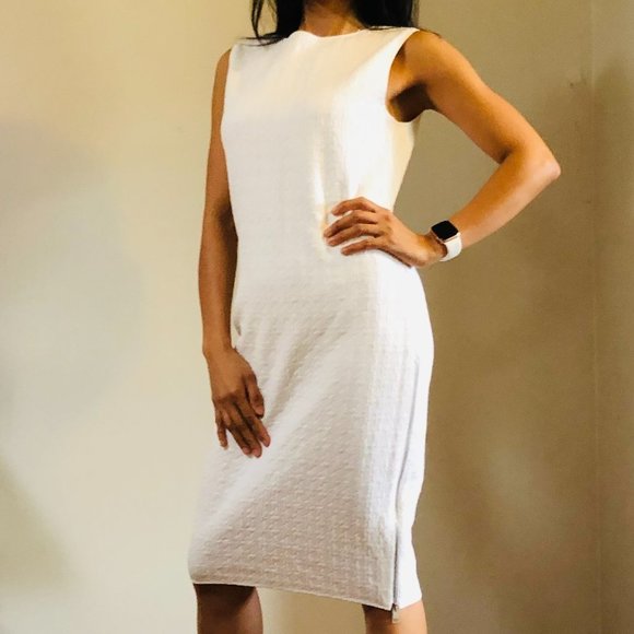 Chic White Midi Dress with Timeless Elegance - Picture 1 of 8